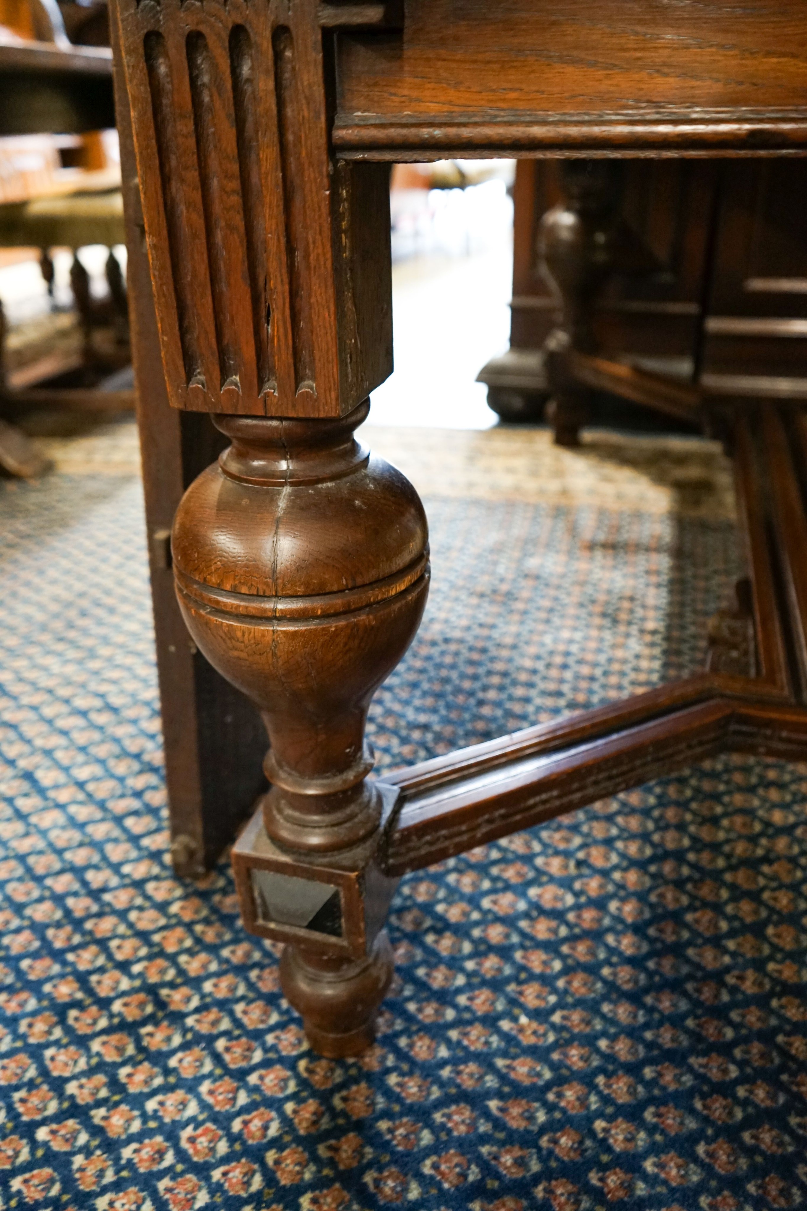 A 19th century Dutch rectangular oak extending dining table, 220cm extended, width 94cm, height 76cm on four carved bulbous supports (two additional leaves) and a set of five dining chairs